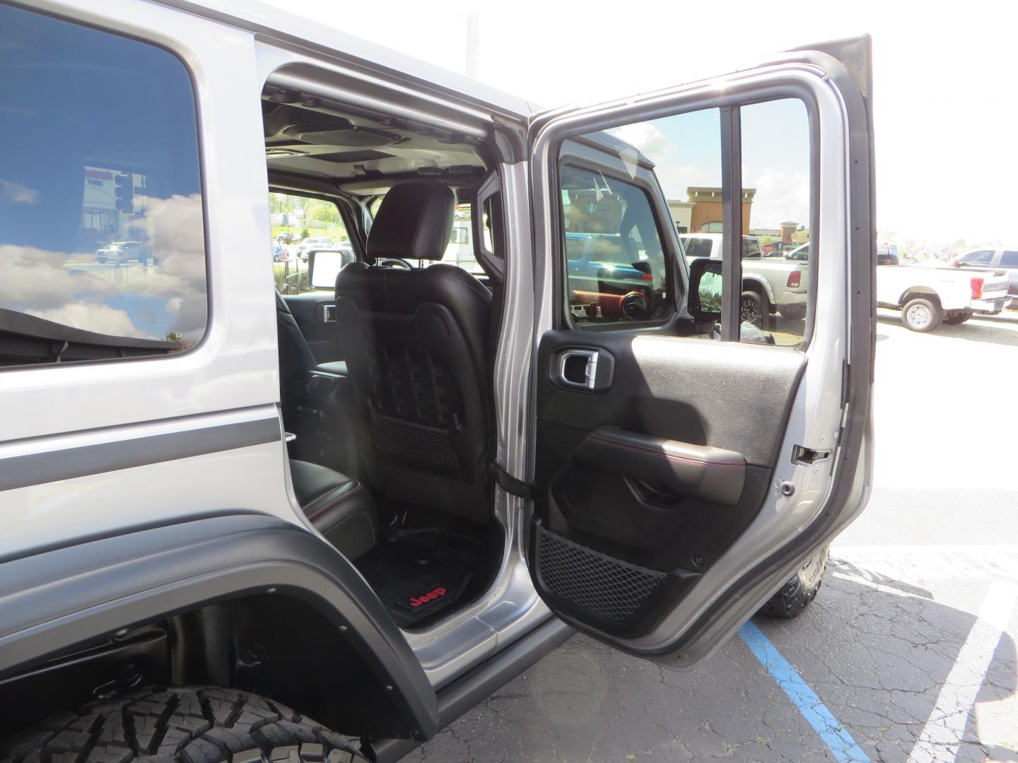 2021 SILVER /BLACK Jeep Wrangler Unlimited Rubicon (1C4HJXFG7MW) with an 3.6L V6 DOHC 24V FFV engine, 6A transmission, located at 2630 Grass Valley Highway, Auburn, CA, 95603, (530) 508-5100, 38.937893, -121.095482 - Features - Zone Offroad 3" Lift kit, Fox shocks, 37" Nitto Ridge Grappler tires, 17" Fuel Piston wheels, Warn winch, KC led lights, Voswitch switches, Teraflex HD tire relocation, Fire extinguisher, High Lift Jack, Shovel, Axe, Jumper Cables, and flat towable. - Photo#53